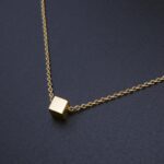 Collier cube doré à l'or fin